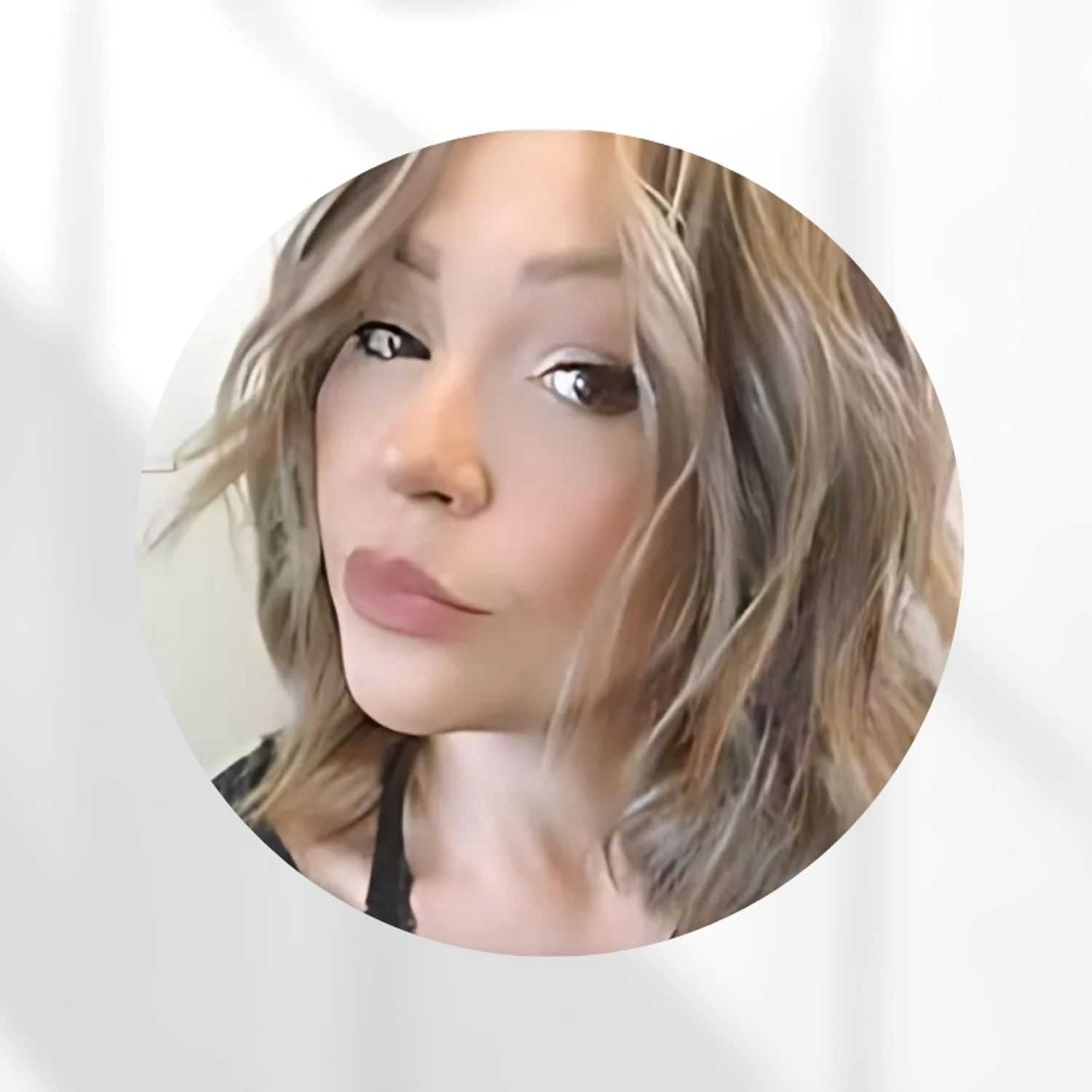 Portrait of Melissa Muro, a professional stylist at Zootcuts, showcasing their expertise and style.